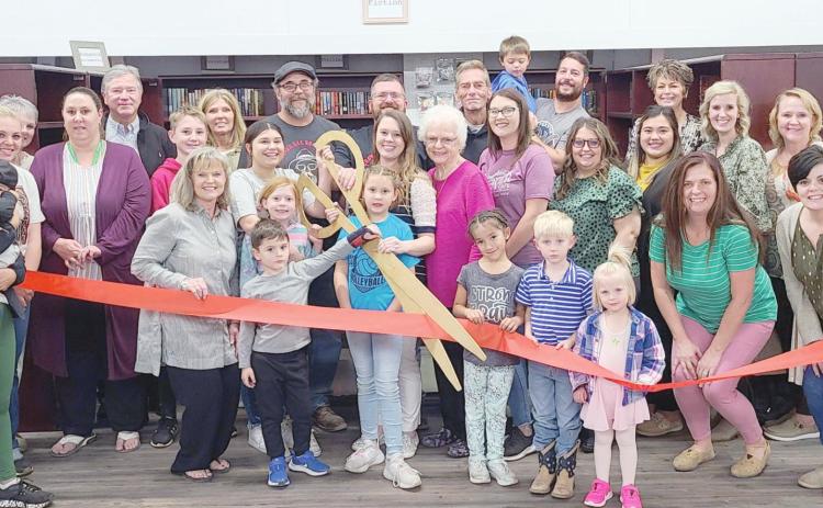 RIBBON CUTTING FOR PINK ROSE BOOK SHOP