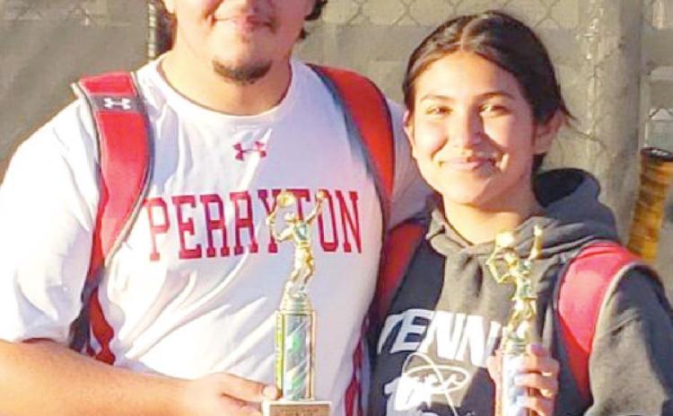WINNING DUO—PHS mixed doubles team Manuel Granillo and Yadira Ontiveros flash some of the hardware they have won this season in the event.