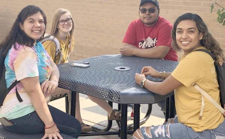 TAKING A BREAK FROM CLASS-Frank Phillips College Allen Campus students, from left, Rubi Borjas, Abby Feger, Jose Rosales and Ashley Flores are part of the Pathways program, which provides tuition, books and fees for eligible Perryton High School students while in high school and then while attending community college. The Pathways program has been very successful, with over 90 participants.