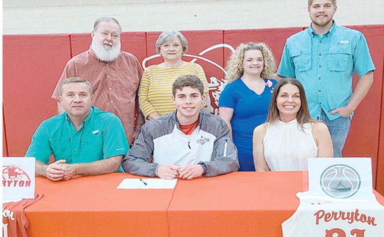 PSHIGODA SIGNS WITH CLARENDON— In May, recent Perryton High School graduate Tad Pshigoda officially signed a letter of intent to play basketball at Clarendon College. Pictured are, from left, front row: Brian Pshigoda, Tad Pshigoda, and Tamarachena Pshigoda; back row: Vernon Pshigoda, Jean Pshigoda, Lexi Pshigoda, and Dillon Pshigoda.
