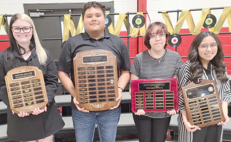 Perryton High School students were honored and recognized for their academic achievements during the year at the Academic Awards Banquet held in Rangerette Gym. Speech and drama students receiving awards included, from left: Rhia Hargues (Outstanding Drama Student), Elpidio Elias Becerril (Outstanding Speech Student), Milagros Espino (Outstanding Technician), and Grace Revilla (Most Promising Newcomer). Not pictured is Carlos Hernandez, winner of the Jack R. Allen Speech Award.
