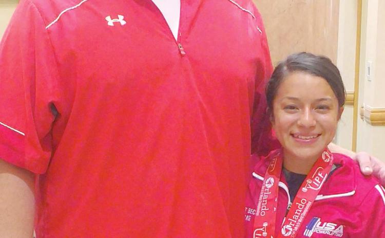 Coach Casey Arruda with world champion powerlifter Janet Becerril