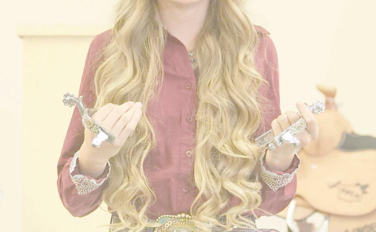 Scarlett Thomas, 13, granddaughter of Harold and Susan Courson, was awarded a set of spurs for the Oakland Dahmer Award by the Oklahoma Junior Rodeo Association. Thomas received the award for her sportsmanship and encouragement toward others. Thomas attends Fort Elliott High School in Briscoe. Thomas has also been awarded year-end champion in barrel racing, reserve year-end champion in pole bending, fifth place year-end champion in goat tying, and all-around third place year-end champion.