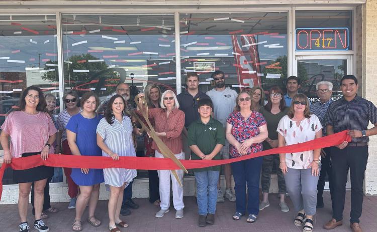 RIBBON-CUTTING AT PERRYTON OFFICE SUPPLY – Members of the Perryton-Ochiltree Chamber of Commerce, along with friends, family, staff, and well-wishers were on hand recently for a ribbon-cutting ceremony for Perryton Office Supply at 417 S. Main in Perryton. The office supply and equimpent store is owned by Kelly King.