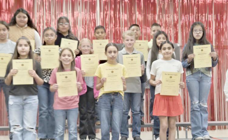 Fifth graders at Williams Intermediate School receiving American Legion outstanding citizenship awards were, first row, from left, Elfego Samaniego, Valeria Pinon, Sofie Frost, Sofia Garcia, and Kaily Loma and American Legion representative JW Brown; second row, Jaquelin Pedraza, Jazmin Vega, McKenzie Meyer, Jace WInegarner, Valeria Espino, and Giselle Loma; and third row, Aurora Hernandez Ayala, Frida Rodriguez, Iker Escobar, and Brody Carreon