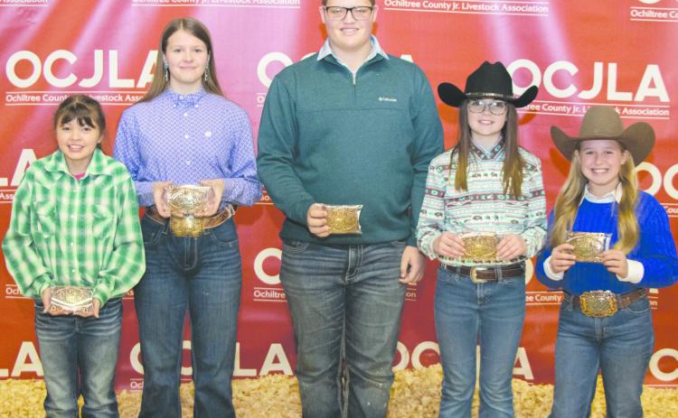 RESERVE GRAND CHAMPION WINNERS— The Reserve Grand Champion winners were presented with their buckle awards at this year’s Ochiltree County Junior Livestock Show and Sale on Jan. 19-20. Pictured are, from left, front row, Chloe Richardson (Reserve Grand Champion Sheep), Tana Williams (Reserve Grand Champion Heifer), Landry Anderson (Reserve Grand Champion Swine), Amelia Jumper (Reserve Grand Champion Goat), and Lakyn Boxwell (Reserve Grand Champion Steer). (Photo Credit: Tessa Powell)