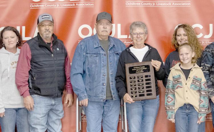 STOCK SHOW DEDICATED TO SPLAN— This year’s Ochiltree County Junior Livestock Show and Sale was dedicated to Ruth Ann Splan. Pictured are, from left, Garrett McMillian, Caileigh Johnston, Kristen Lane, Joe Lane, Dennis Splan, Ruth Ann Splan, Jennifer Stickney, Bryer McMullen (in front), Jackson McMullen, and Jace Marshall. ( Photo credit: Hailey Clark of Hailey Renee Photography)