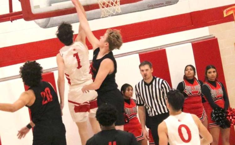 RANGERS FACE BORGER – Daxton Rigdon, #1, drives to the bucket and scores during Tuesdays game against the Borger Bulldogs. See story for more information.